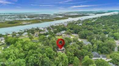 Tucked away on a spacious, pie-shaped lot, this hidden gem on on Olde Point Golf and Country Club in North Carolina - for sale on GolfHomes.com, golf home, golf lot