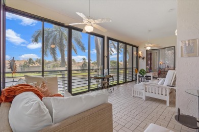 Stunning second-floor condo with breathtaking lake views! This on Boca Delray Golf and Country Club in Florida - for sale on GolfHomes.com, golf home, golf lot