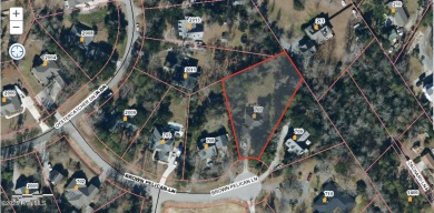 Tucked away on a spacious, pie-shaped lot, this hidden gem on on Olde Point Golf and Country Club in North Carolina - for sale on GolfHomes.com, golf home, golf lot