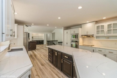 Stunning Golf Course Retreat on a Wooded Lot in Highly Desired on Ankeny Golf and Country Club in Iowa - for sale on GolfHomes.com, golf home, golf lot