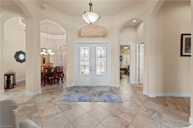 This sought-after Aragon model sits on a premium lakefront lot on Estero Country Club in Florida - for sale on GolfHomes.com, golf home, golf lot