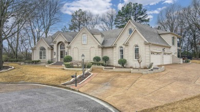 This amazing estate tucked in a cozy cove in Collierville on on Memphis National Golf Club in Tennessee - for sale on GolfHomes.com, golf home, golf lot