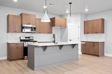 Step into The Sunrise, where versatile living meets spacious on  in Utah - for sale on GolfHomes.com, golf home, golf lot