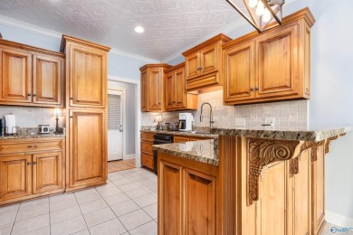 Beautiful brick home overlooking hole #9 at Canebrake Golf on Canebrake Golf Club in Alabama - for sale on GolfHomes.com, golf home, golf lot
