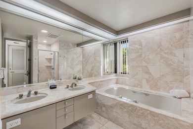 Mauna Lani Point B102 is a desirable ground-floor one-bedroom on Mauna Lani Resort Golf Course in Hawaii - for sale on GolfHomes.com, golf home, golf lot