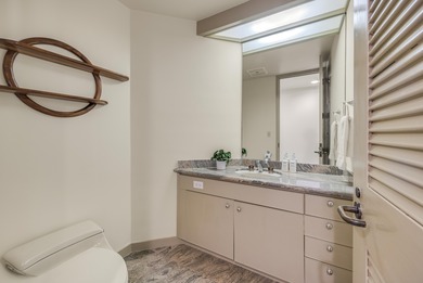 Mauna Lani Point B102 is a desirable ground-floor one-bedroom on Mauna Lani Resort Golf Course in Hawaii - for sale on GolfHomes.com, golf home, golf lot