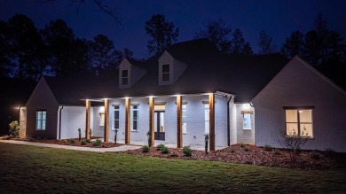 EXPERIENCE A PERFECT BLEND OF LUXURY, COMFORT, AND BREATHTAKING on Harbor Club Golf and Country Club in Georgia - for sale on GolfHomes.com, golf home, golf lot