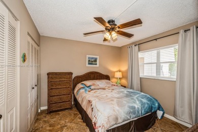 Step into the tranquility of this furnished 2 bedroom, 2 on Oriole Golf and Tennis Club in Florida - for sale on GolfHomes.com, golf home, golf lot
