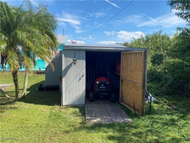 Enjoy the Florida lifestyle in this 3 bedroom, 2 bathroom one on Port Charlotte Golf Club in Florida - for sale on GolfHomes.com, golf home, golf lot