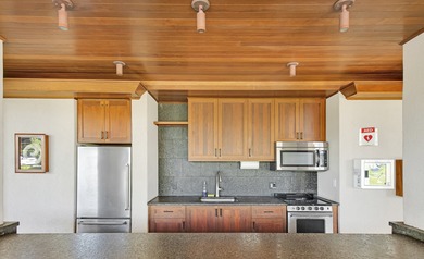 Mauna Lani Point B102 is a desirable ground-floor one-bedroom on Mauna Lani Resort Golf Course in Hawaii - for sale on GolfHomes.com, golf home, golf lot