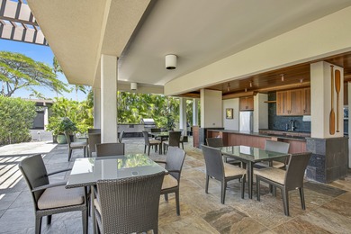 Mauna Lani Point B102 is a desirable ground-floor one-bedroom on Mauna Lani Resort Golf Course in Hawaii - for sale on GolfHomes.com, golf home, golf lot