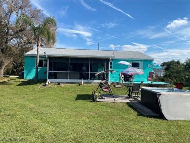 Enjoy the Florida lifestyle in this 3 bedroom, 2 bathroom one on Port Charlotte Golf Club in Florida - for sale on GolfHomes.com, golf home, golf lot