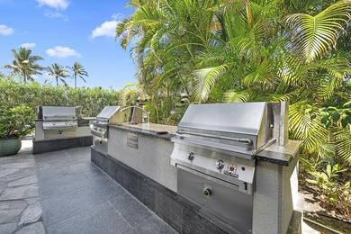 Mauna Lani Point B102 is a desirable ground-floor one-bedroom on Mauna Lani Resort Golf Course in Hawaii - for sale on GolfHomes.com, golf home, golf lot