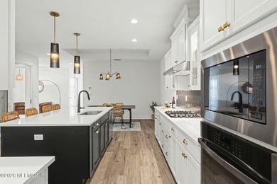 Like new, crisp, modern Villa with designer finishes throughout on Palm Valley Golf Club in Florida - for sale on GolfHomes.com, golf home, golf lot