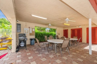 Step into the tranquility of this furnished 2 bedroom, 2 on Oriole Golf and Tennis Club in Florida - for sale on GolfHomes.com, golf home, golf lot