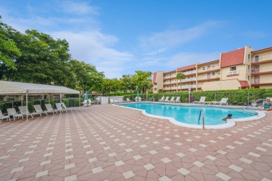Step into the tranquility of this furnished 2 bedroom, 2 on Oriole Golf and Tennis Club in Florida - for sale on GolfHomes.com, golf home, golf lot