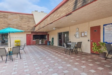 Step into the tranquility of this furnished 2 bedroom, 2 on Oriole Golf and Tennis Club in Florida - for sale on GolfHomes.com, golf home, golf lot
