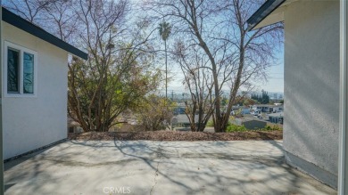 Welcome to your newly remodeled retreat! This stunning 4-bedroom on Industry Hills At Pacific Palms Resort in California - for sale on GolfHomes.com, golf home, golf lot