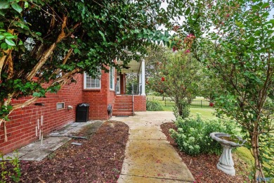 Beautiful brick home overlooking hole #9 at Canebrake Golf on Canebrake Golf Club in Alabama - for sale on GolfHomes.com, golf home, golf lot