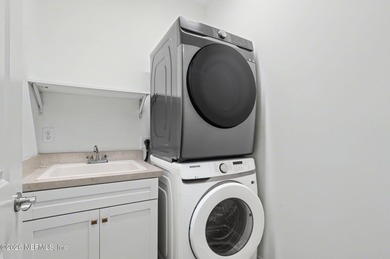 Like new, crisp, modern Villa with designer finishes throughout on Palm Valley Golf Club in Florida - for sale on GolfHomes.com, golf home, golf lot