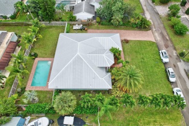 Huge price reduction!  BEST BUY IN TCC!  $504 sf for 2016 build on Tequesta Country Club in Florida - for sale on GolfHomes.com, golf home, golf lot