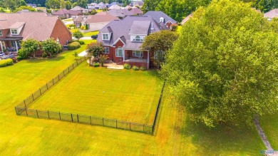 Beautiful brick home overlooking hole #9 at Canebrake Golf on Canebrake Golf Club in Alabama - for sale on GolfHomes.com, golf home, golf lot