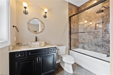 This home features water views from nearly every room on Cavalier Golf and Yacht Club in Virginia - for sale on GolfHomes.com, golf home, golf lot