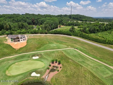 Experience the epitome of luxury living with this gorgeous golf on Wind River Golf Course in Tennessee - for sale on GolfHomes.com, golf home, golf lot