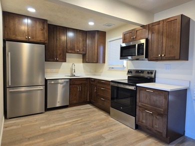 Fully Remodeled & Repiped ''No-Stairs'' Upstairs Unit! on Sunbrook Golf Course in Utah - for sale on GolfHomes.com, golf home, golf lot