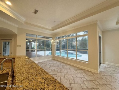 STUNNING PANORAMIC VIEWS greet you in this PREMIER on Queens Harbour Yacht and Country Club in Florida - for sale on GolfHomes.com, golf home, golf lot