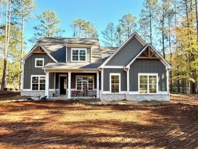 Located in Harbor Club on Lake Oconee, this Emmeline plan by on Harbor Club Golf and Country Club in Georgia - for sale on GolfHomes.com, golf home, golf lot