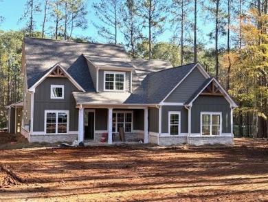 Located in Harbor Club on Lake Oconee, this Emmeline plan by on Harbor Club Golf and Country Club in Georgia - for sale on GolfHomes.com, golf home, golf lot