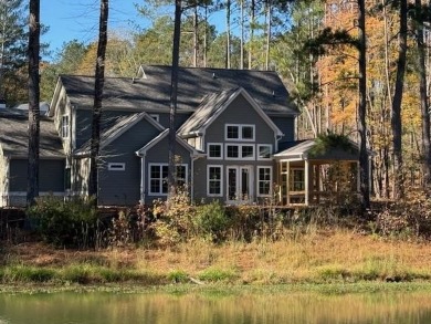 Located in Harbor Club on Lake Oconee, this Emmeline plan by on Harbor Club Golf and Country Club in Georgia - for sale on GolfHomes.com, golf home, golf lot