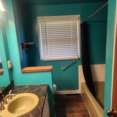 Discover comfort and convenience in this charming brick ranch on Hillcrest Golf and Country Club in South Dakota - for sale on GolfHomes.com, golf home, golf lot