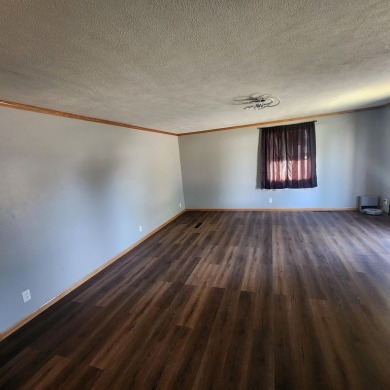 Discover comfort and convenience in this charming brick ranch on Hillcrest Golf and Country Club in South Dakota - for sale on GolfHomes.com, golf home, golf lot