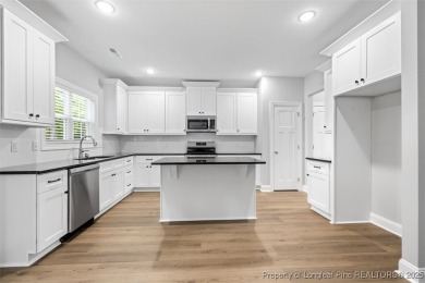Brand new and ready for you! Builder is offering concessions for on Carolina Trace Country Club in North Carolina - for sale on GolfHomes.com, golf home, golf lot
