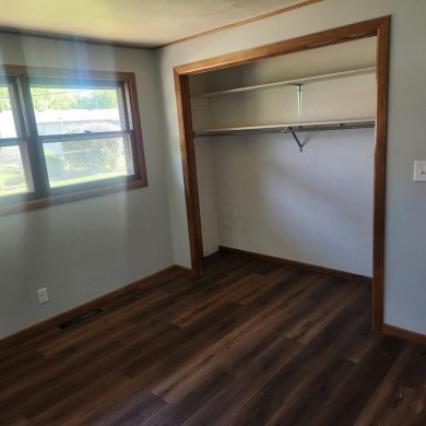 Discover comfort and convenience in this charming brick ranch on Hillcrest Golf and Country Club in South Dakota - for sale on GolfHomes.com, golf home, golf lot
