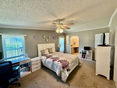 Home is located in Water Oak Country Club Estates in Lady Lake on Water Oak Country Club Estates in Florida - for sale on GolfHomes.com, golf home, golf lot