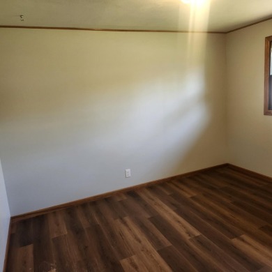 Discover comfort and convenience in this charming brick ranch on Hillcrest Golf and Country Club in South Dakota - for sale on GolfHomes.com, golf home, golf lot