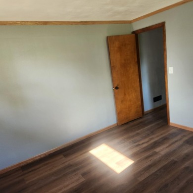 Discover comfort and convenience in this charming brick ranch on Hillcrest Golf and Country Club in South Dakota - for sale on GolfHomes.com, golf home, golf lot