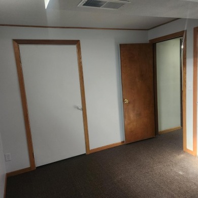 Discover comfort and convenience in this charming brick ranch on Hillcrest Golf and Country Club in South Dakota - for sale on GolfHomes.com, golf home, golf lot