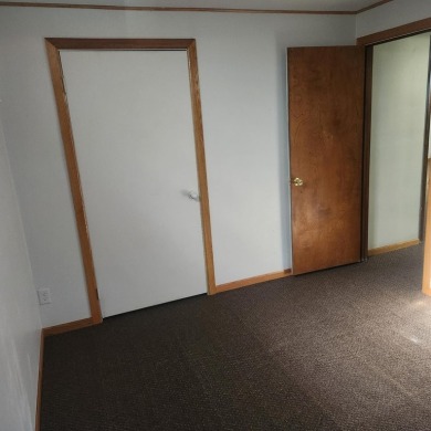 Discover comfort and convenience in this charming brick ranch on Hillcrest Golf and Country Club in South Dakota - for sale on GolfHomes.com, golf home, golf lot