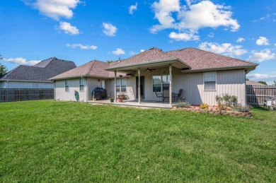 Welcome to this 3-bedroom, 2.5-bathroom home nestled within a on Marshfield Country Club in Missouri - for sale on GolfHomes.com, golf home, golf lot