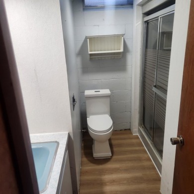 Discover comfort and convenience in this charming brick ranch on Hillcrest Golf and Country Club in South Dakota - for sale on GolfHomes.com, golf home, golf lot