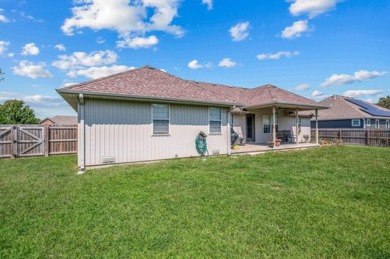 Welcome to this 3-bedroom, 2.5-bathroom home nestled within a on Marshfield Country Club in Missouri - for sale on GolfHomes.com, golf home, golf lot