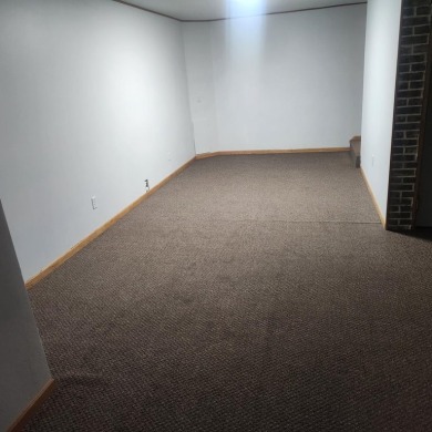 Discover comfort and convenience in this charming brick ranch on Hillcrest Golf and Country Club in South Dakota - for sale on GolfHomes.com, golf home, golf lot