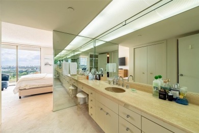 Step into luxury at Turnberry North Tower with this spacious on Turnberry Isle Resort and Club in Florida - for sale on GolfHomes.com, golf home, golf lot