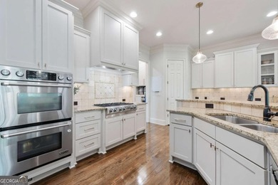 Welcome to 2230 Cambridge Hill Court, an elegant 3-story home on Hamilton Mill Golf Club in Georgia - for sale on GolfHomes.com, golf home, golf lot