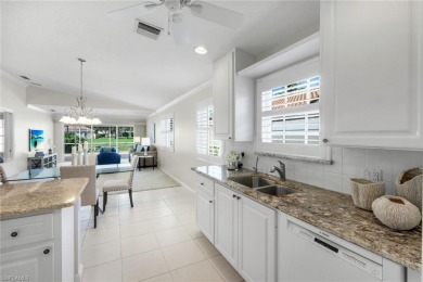 Immaculate Extended Capri Villa with Oversized Lakefront Lanai on Arrowhead Golf Club At Heritage Greens in Florida - for sale on GolfHomes.com, golf home, golf lot