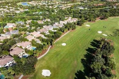 This prestigious 4 bedroom, 5 bath Parkland Golf  Country Club on Parkland Golf Club in Florida - for sale on GolfHomes.com, golf home, golf lot